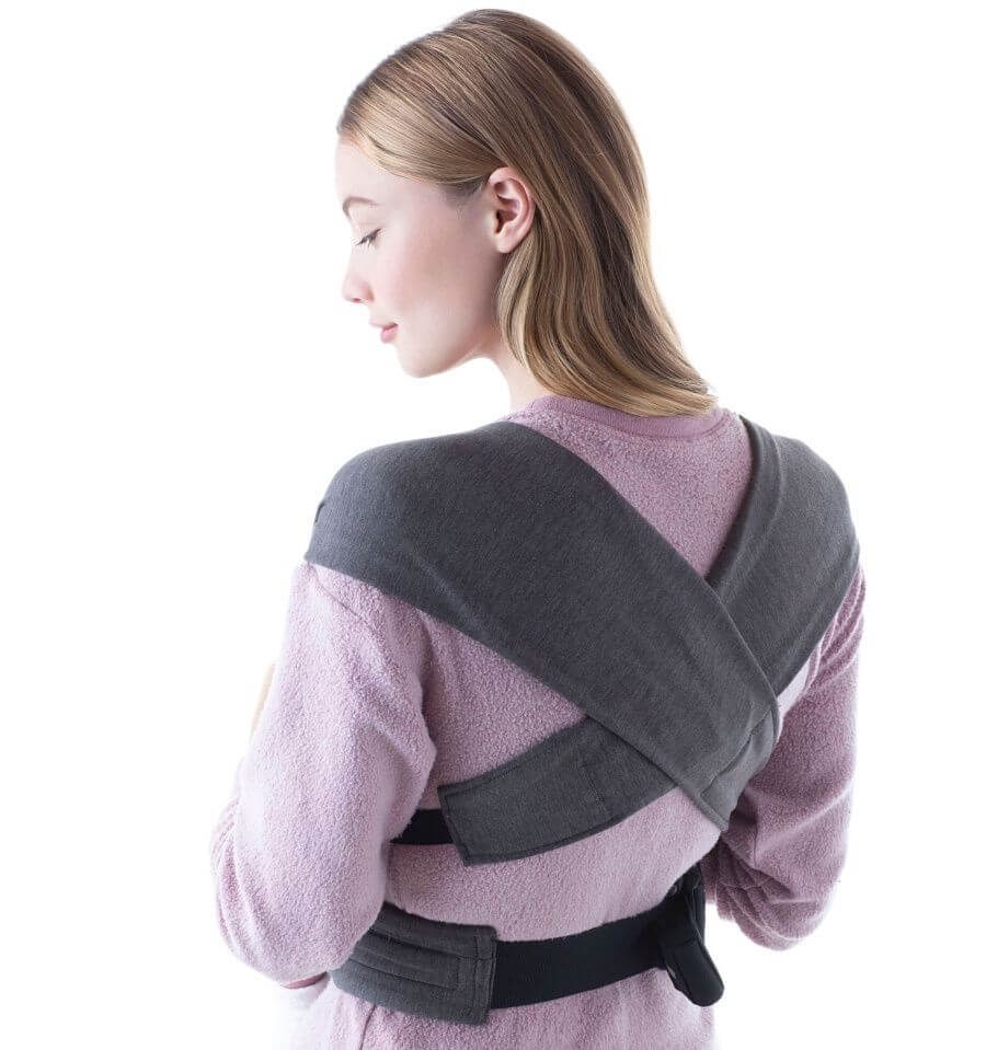 Ergobaby Embrace - Heather Grey baby carrier worn by a woman from the back, showcasing its soft, ergonomic design | Babymaxi