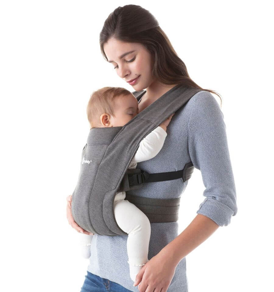 Mother with baby in Ergobaby Embrace - Heather Grey carrier, combining softness and ergonomic design for newborn comfort | Babymaxi