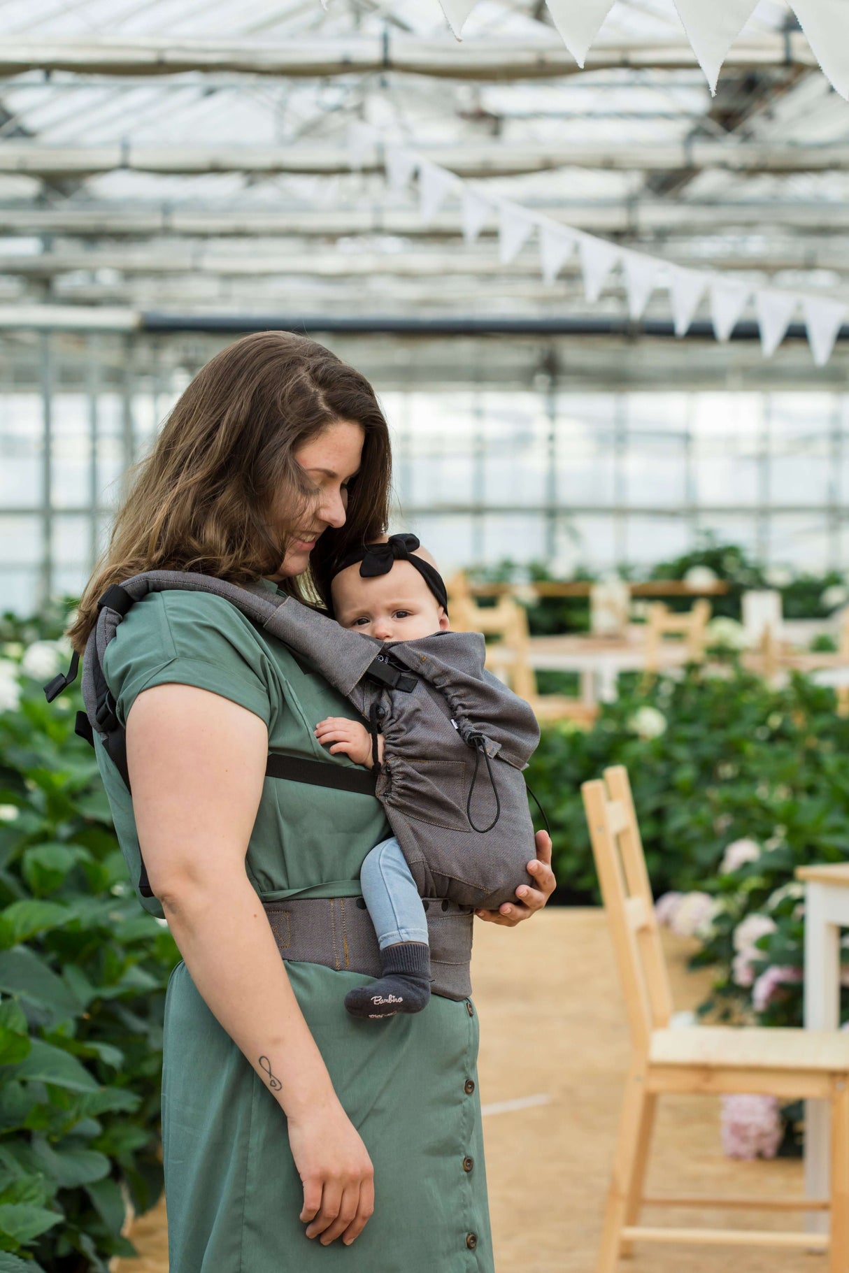 Neko Switch Baby Carrier - Bold, 2 extra hoods in use with a smiling baby, perfect for comfort and support | Babymaxi