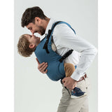Isara Preschooler (up to 30kg) - Bluestone ergonomic baby carrier in use by parent with child, perfect for toddlers and kids | Babymaxi