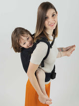 Isara Preschooler (up to 30kg) - Noire baby carrier in use, showcasing adjustable design and comfort | Babymaxi