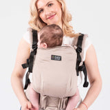 Isara The One - Caffe Latte baby carrier worn by a parent with baby, ideal for comfort and adventures | Babymaxi