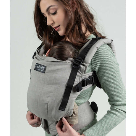 Isara The One - Misty Linen baby carrier in sage green, featuring ergonomic design and soft linen fabric | Babymaxi