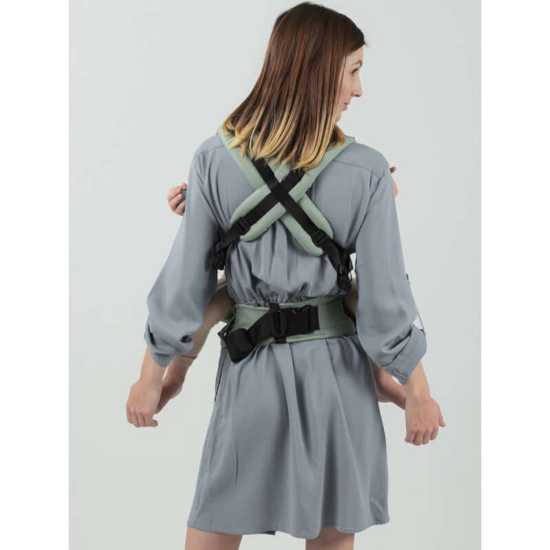 Isara The One - Sage Green Linen baby carrier seen from behind, showcasing ergonomic design and stylish look | Babymaxi