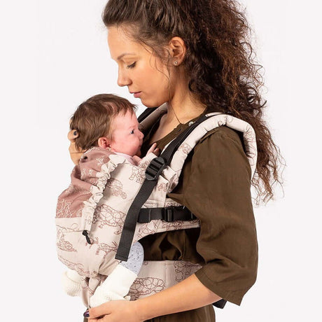 Isara The One - Wildlife Sandy, WWF Collaboration baby carrier with a mother holding her baby securely | Babymaxi