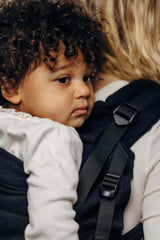 LennyLamb LennyPreschool (up to 30kg) - Little Herringbone Ebony Black toddler carrier in use | Babymaxi
