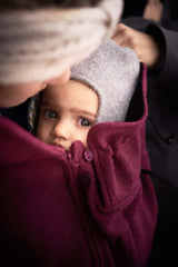 Mamalila Hooded Babywearing Coat Vienna - Berry on a child, showcasing comfort and warmth for outdoor adventures | Babymaxi