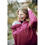 Mamalila Softshell Babywearing Jacket Allrounder - Berry worn by a smiling woman with a baby, showcasing versatility and style | Babymaxi