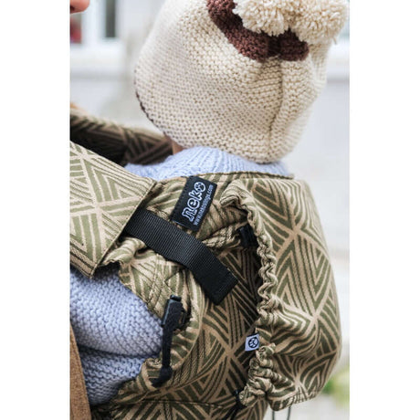 Neko Switch Baby Size - Cedar carrier detail with adjustable straps and baby wearing a knitted hat | Babymaxi