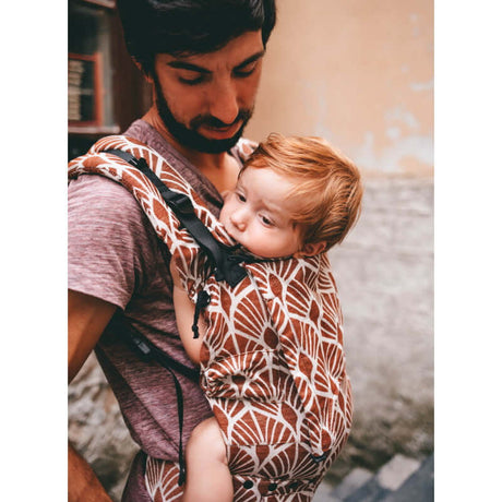 Neko Switch Toddler - Mocha carrier in use with a father holding a child, showcasing ergonomic design | Babymaxi