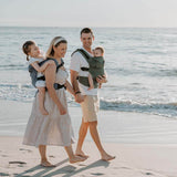 Family enjoying a beach day with Quokkababy E-Carrier - Green Diamond, carrying children comfortably | Babymaxi