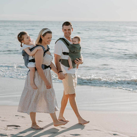 Family enjoying a beach day with Quokkababy E-Carrier - Green Diamond, carrying children comfortably | Babymaxi