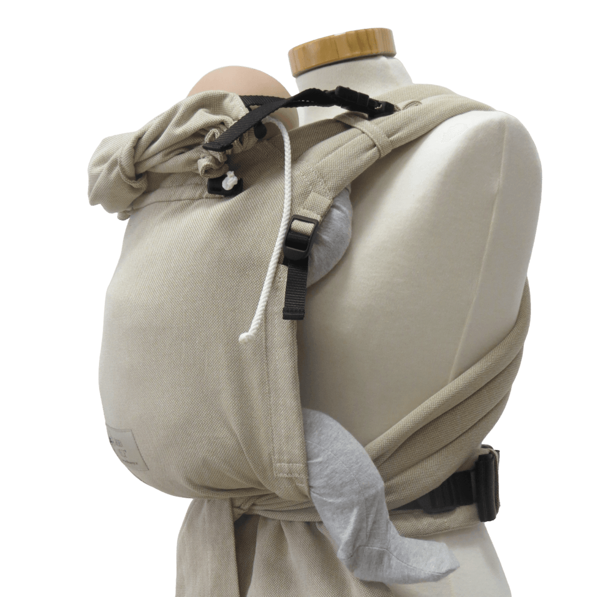 Storchenwiege Talemo Half-Buckle Baby Carrier - Natural on mannequin, adjustable waist belt and wrap-style straps | Babymaxi